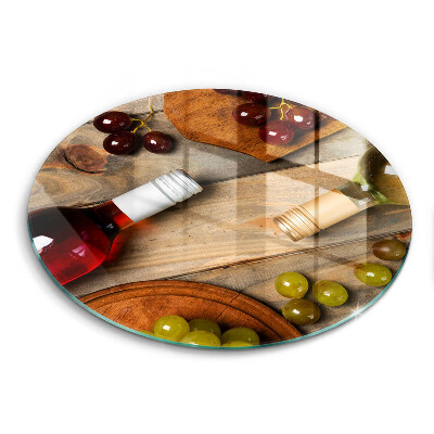 Chopping board glass Bottles of wine and grapes