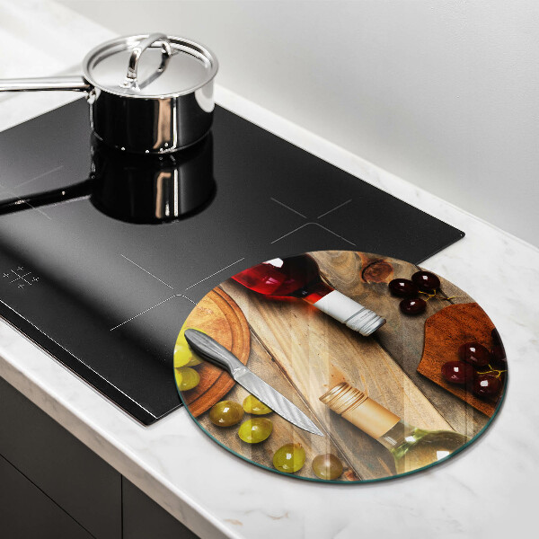 Chopping board glass Bottles of wine and grapes