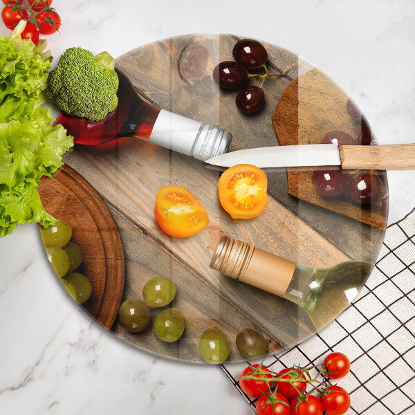 Chopping board glass Bottles of wine and grapes