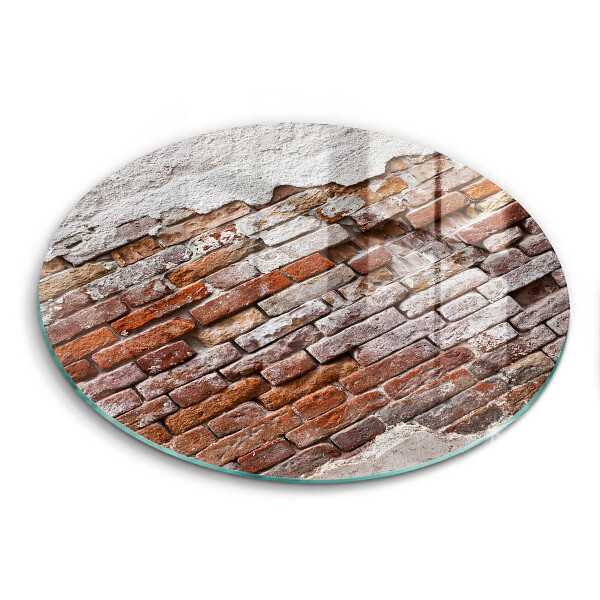 Glass worktop saver Old wall of brick and concrete