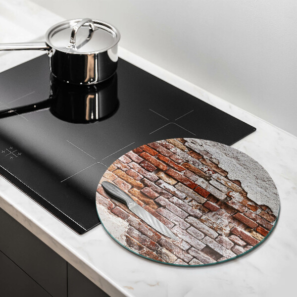 Glass worktop saver Old wall of brick and concrete