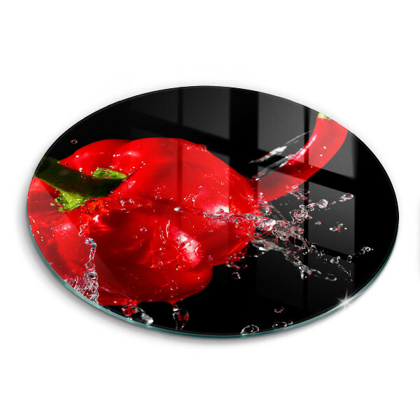 Glass worktop saver Red peppers in water