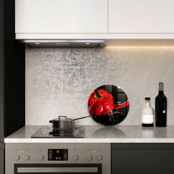 Glass worktop saver Red peppers in water