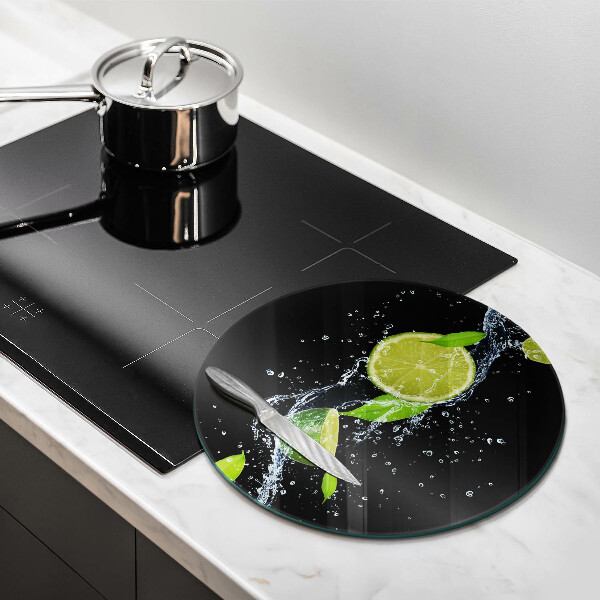 Glass worktop saver Juicy lime in water