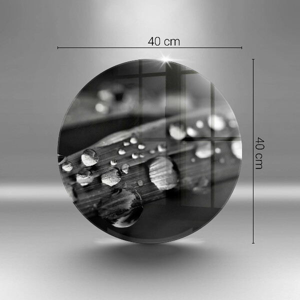 Chopping board glass Drops of dew on the leaves