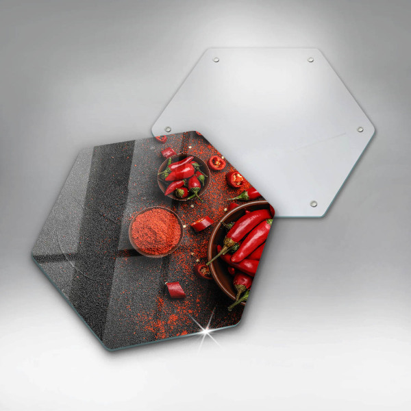 Chopping board glass Red chili peppers