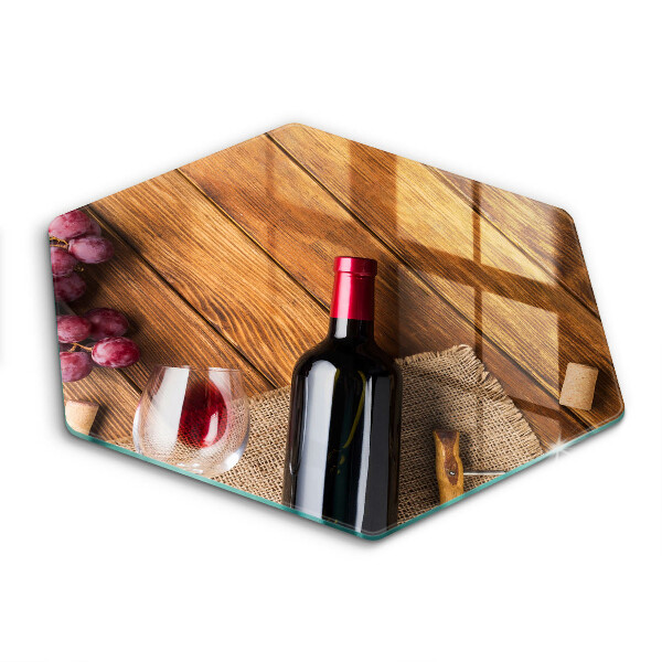 Glass kitchen board A bottle of red wine