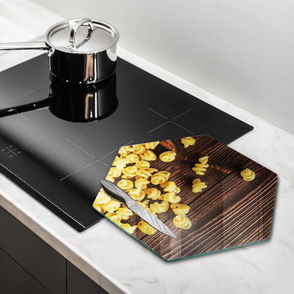Glass kitchen board Pasta on a table