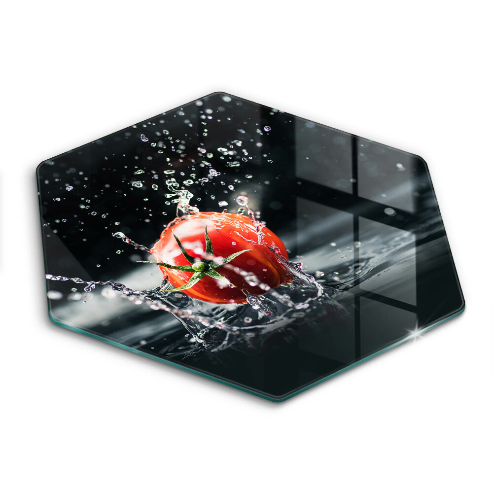 Chopping board glass Tomato in water