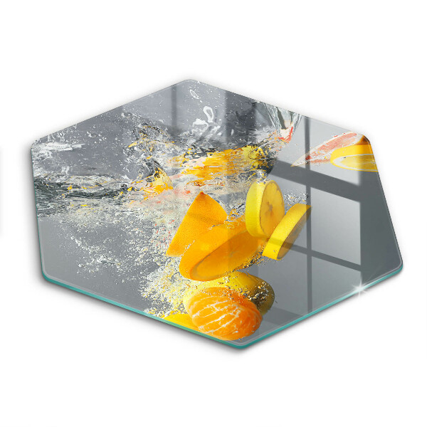 Chopping board glass Lemons in water