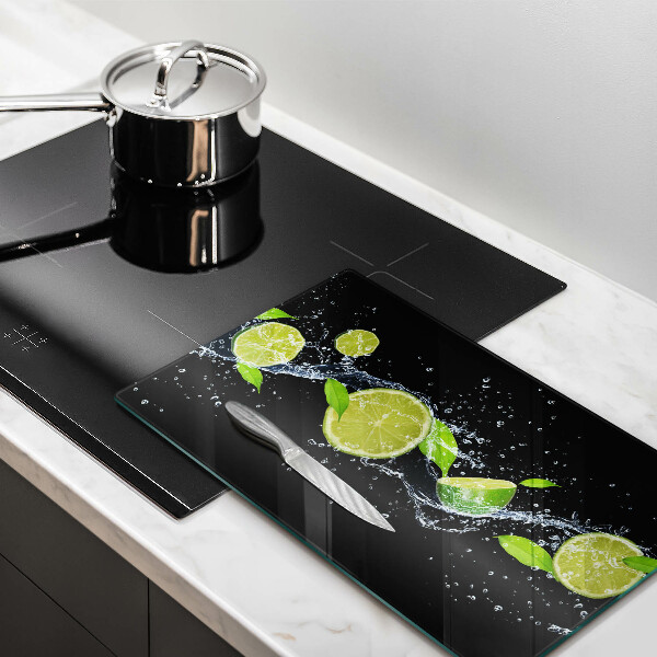 Glass worktop saver Juicy lime in water