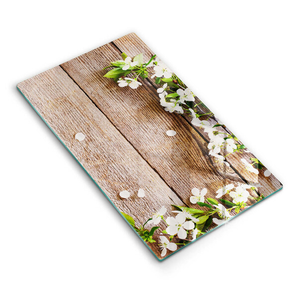 Glass worktop saver White flowers on the boards