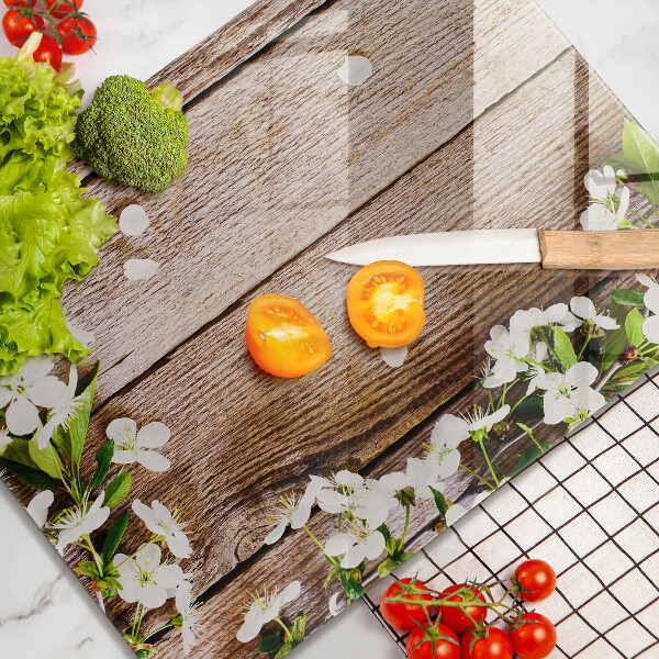 Glass worktop saver White flowers on the boards