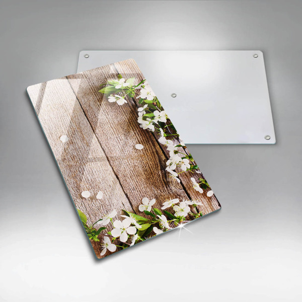 Glass worktop saver White flowers on the boards