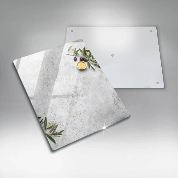 Glass worktop saver Olives on concrete