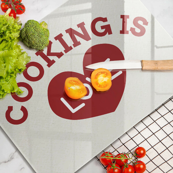 Glass worktop saver The inscription Cooking is love