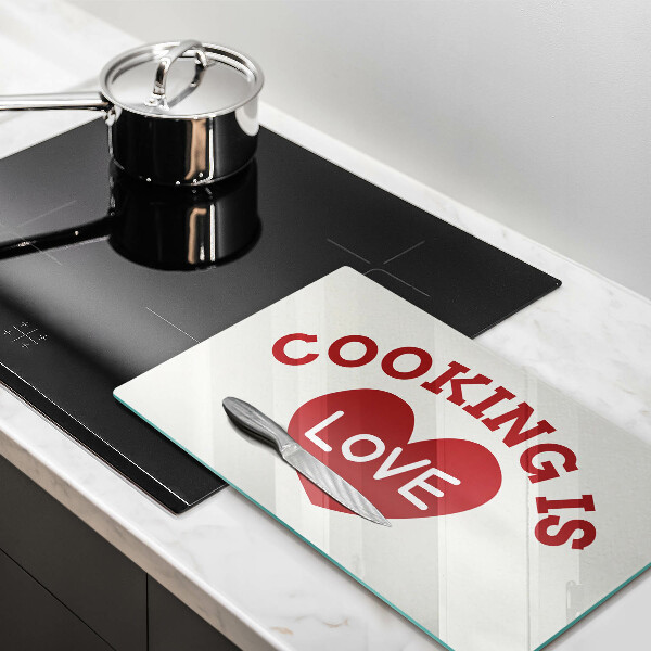 Glass worktop saver The inscription Cooking is love