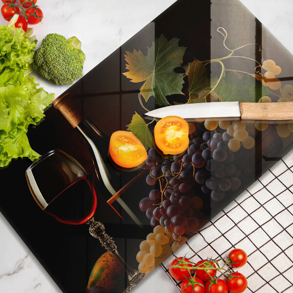 Glass worktop saver A glass of wine and grapes