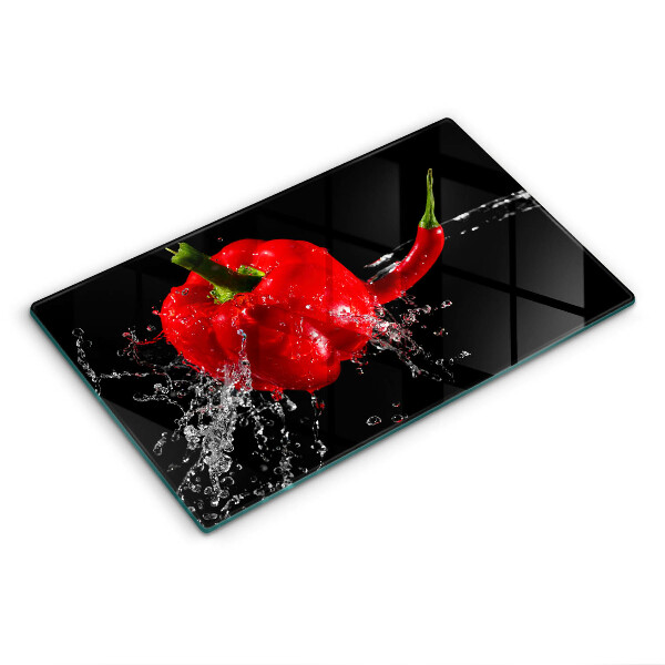 Induction hob protector Red peppers in water