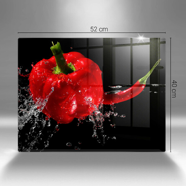 Induction hob protector Red peppers in water