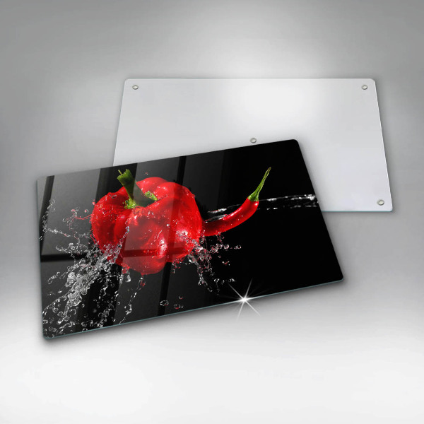 Induction hob protector Red peppers in water