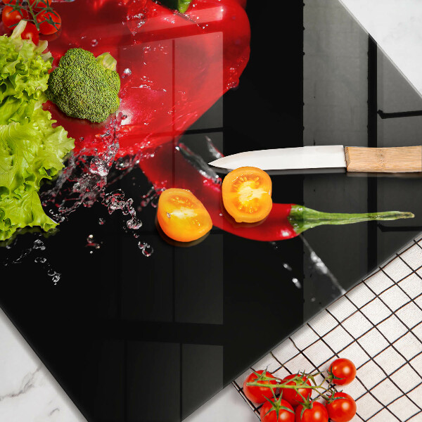 Work surface savers Red peppers in water