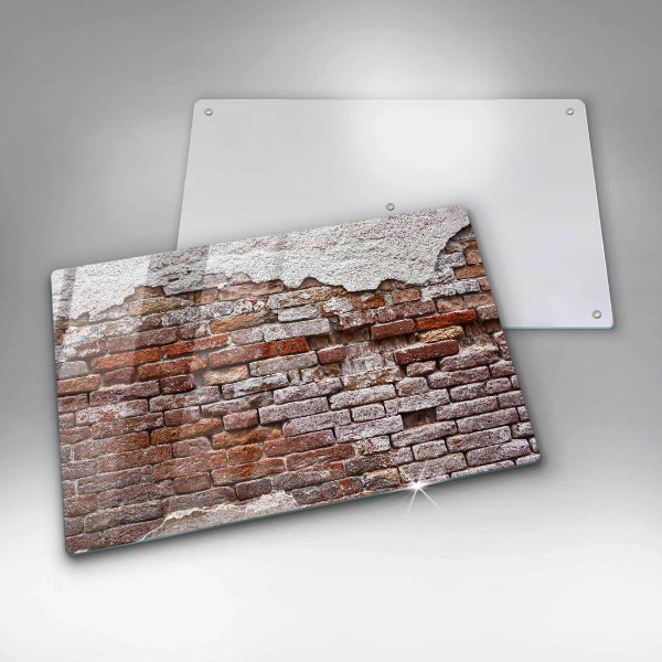 Induction hob cover Old wall of brick and concrete
