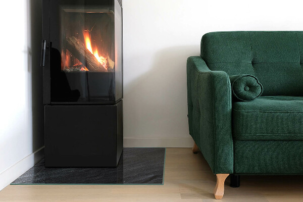 Square glass hearth for log burner Stone surface texture