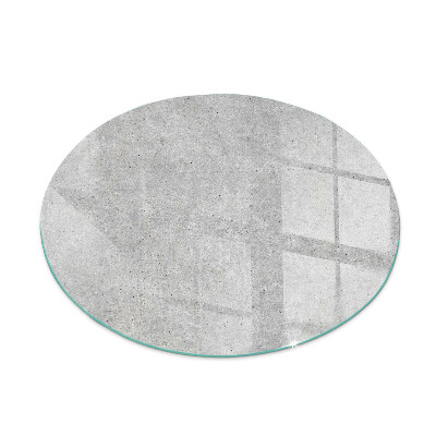 Round glass hearths for wood burners Raw concrete texture