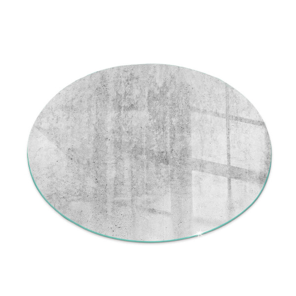Round glass fire hearth Raw concrete texture
