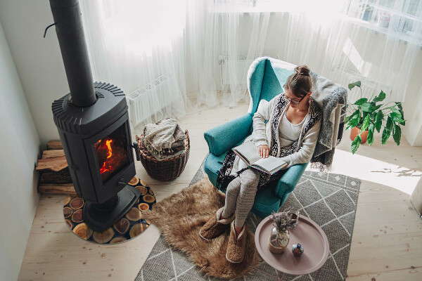 Round glass wood burner hearth Box with cut wood