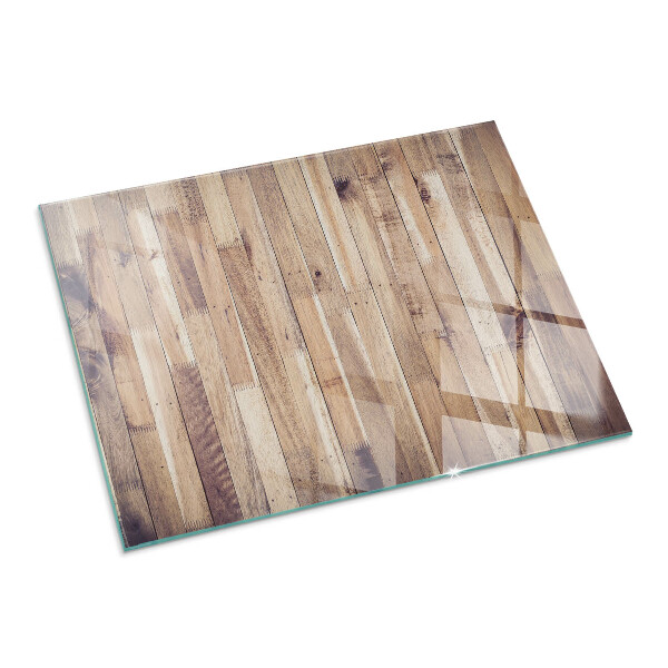 Rectangular glass hearth for wood stove Wooden board in the layout