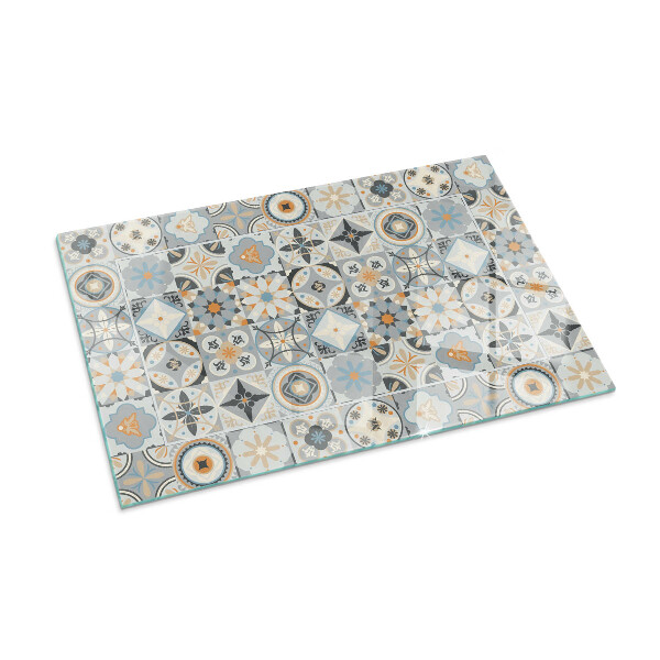 Rectangular glass hearth for log burner Mosaic patterns in tiles