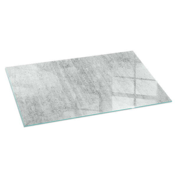 Rectangular glass hearth for log burner Raw concrete texture