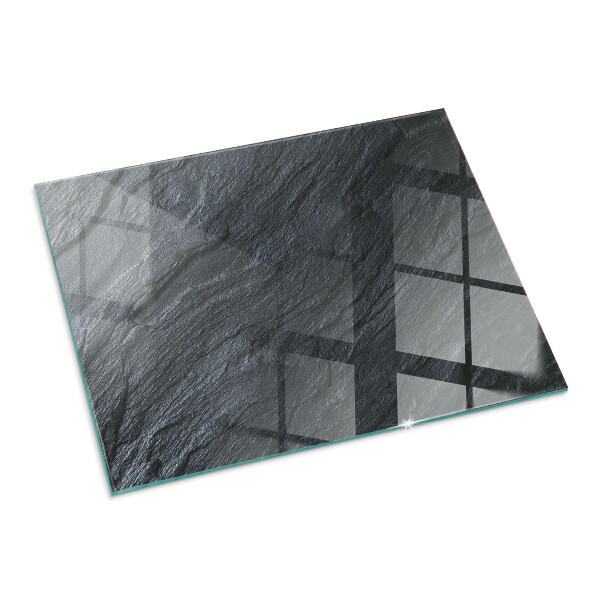Rectangular glass hearth for log burner Stone surface texture
