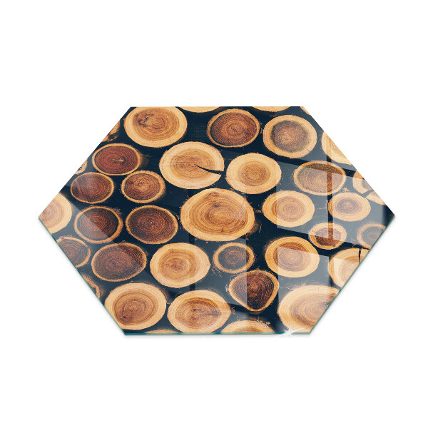 Hexagonal glass hearth for stove Box with cut wood