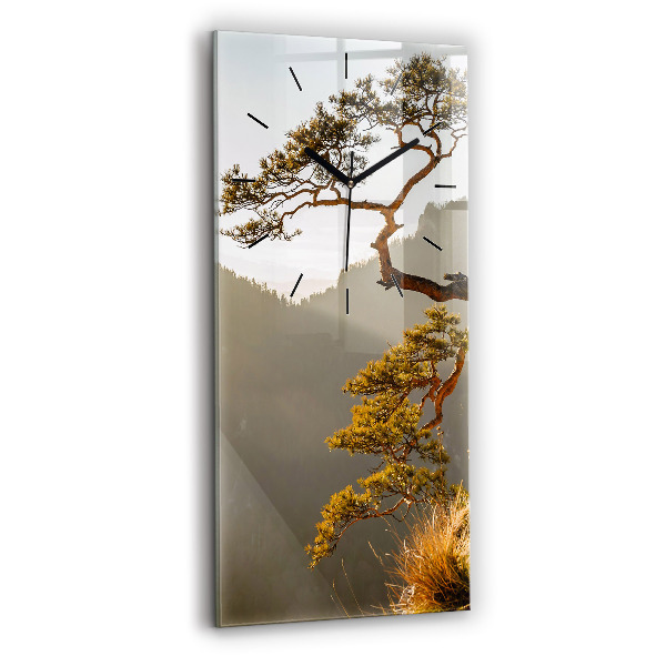 Modern vertical wall clock A tree in the mountains