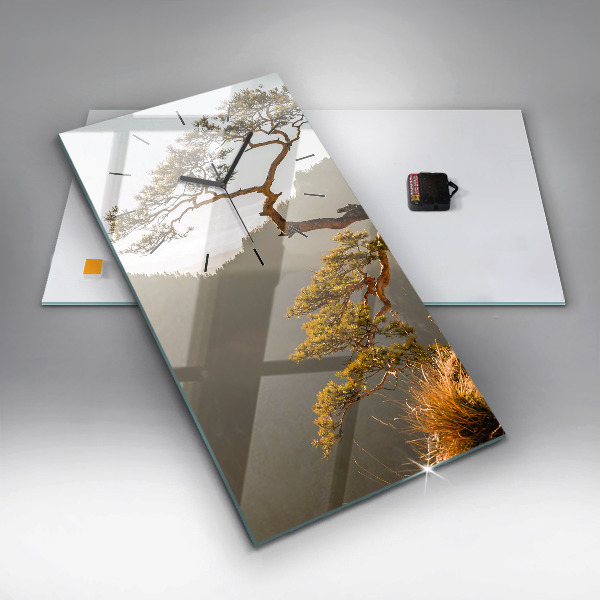 Modern vertical wall clock A tree in the mountains