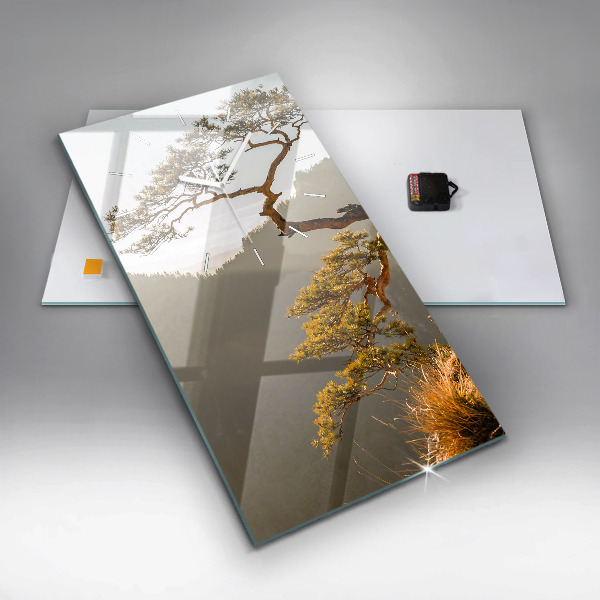 Modern vertical wall clock A tree in the mountains