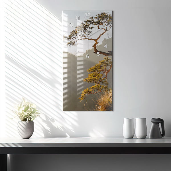 Modern vertical wall clock A tree in the mountains