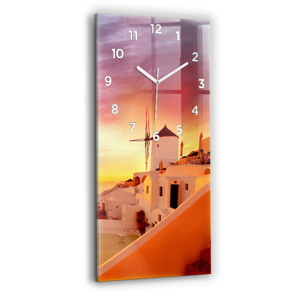 Modern vertical wall clock Old windmill in Santorini