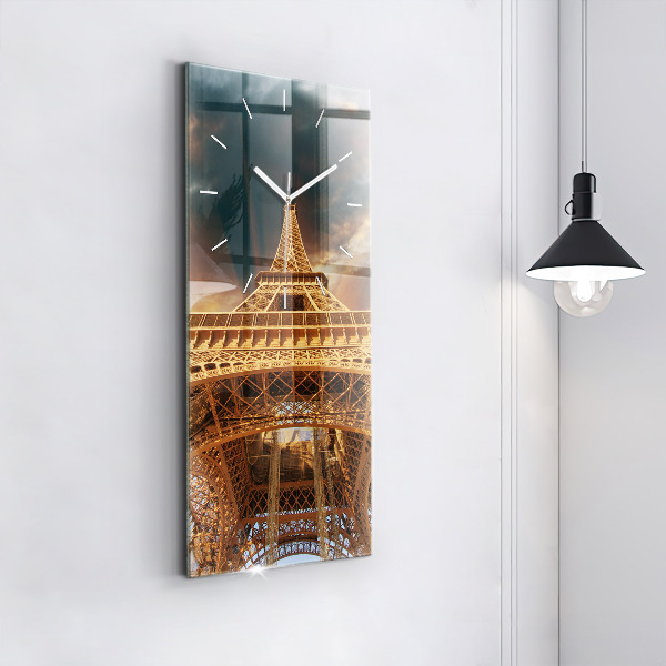 Modern vertical wall clock The Eiffel Tower against the clouds