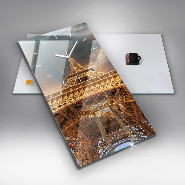 Modern vertical wall clock The Eiffel Tower against the clouds