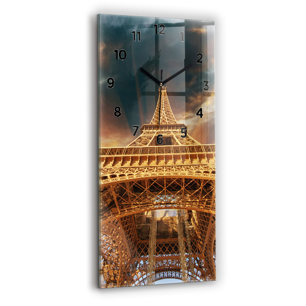 Modern vertical wall clock The Eiffel Tower against the clouds