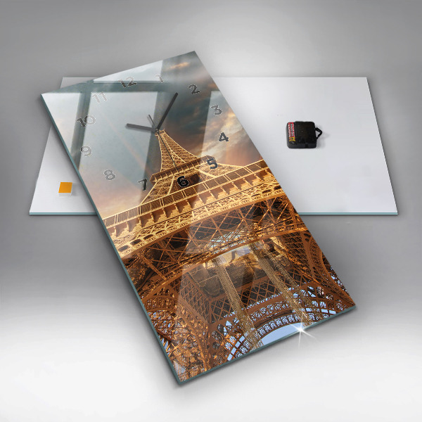 Modern vertical wall clock The Eiffel Tower against the clouds