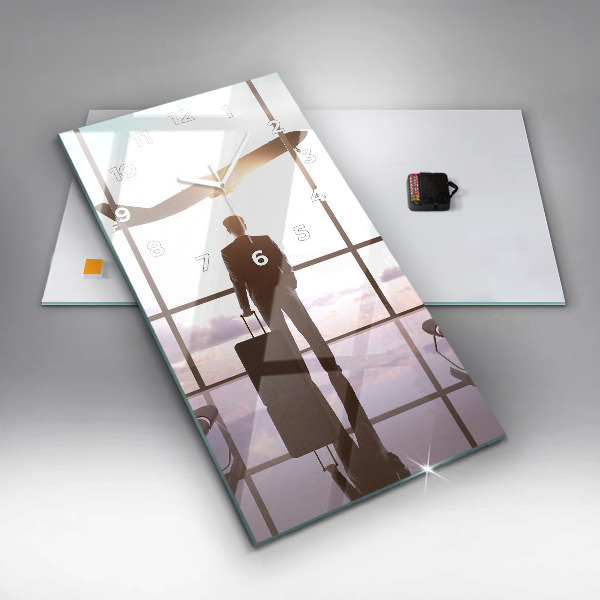 Modern vertical wall clock Man at the airport