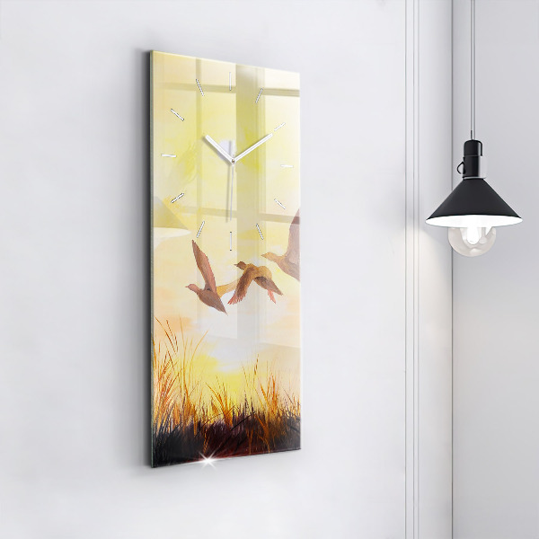 Modern vertical wall clock Cranes at sunset