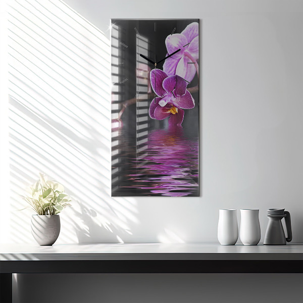 Modern vertical wall clock Orchid flower on the water