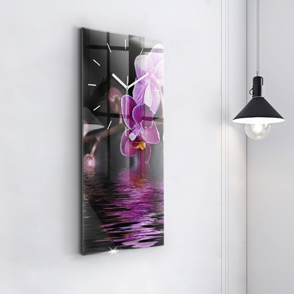 Modern vertical wall clock Orchid flower on the water