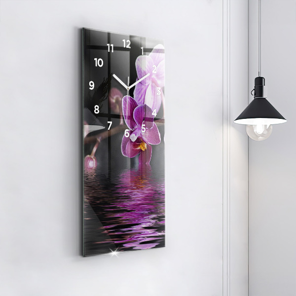 Modern vertical wall clock Orchid flower on the water